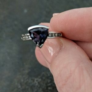 Genuine Tanzanite Flanked by Diamonds in 10k gold.